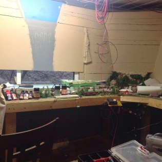 picture of painted wall above model railroad layout