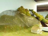 screen used to create a forest scene beside a model railway track
